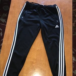 Adidas black pants with white stripes